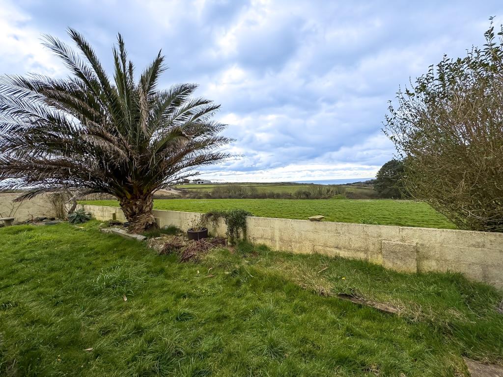 Lot: 128 - DETACHED PROPERTY IN GOOD LOCATION - View from rear garden of countryside and sea beyond